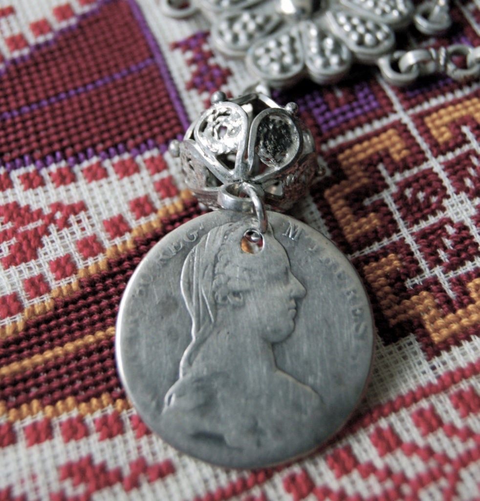 A Maria Theresia Thaler on a Palestinian iznaq or chin-chain